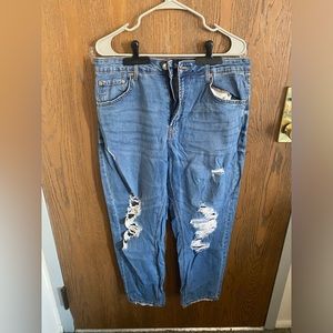 Loose fitting mom jeans.